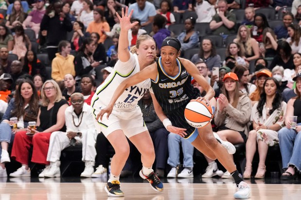 Sky guard Rebekah Gardner, right, drives against the Lynx's Rachel Banham during the second half of a preseason game on May 13 in Toronto.