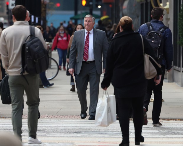 Judge Robert Adrian heads to an Illinois Courts Commission hearing for his actions in the Cameron Vaughan sexual assault case on Nov. 7, 2023, in Chicago. (Stacey Wescott/Chicago Tribune)