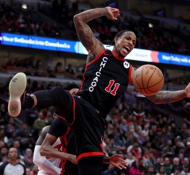 Chicago Bulls forward DeMar DeRozan (11) goes in for a big dunk in the second half of a game against the Toronto Raptors at the United Center on Tuesday, Jan. 30, 2024.