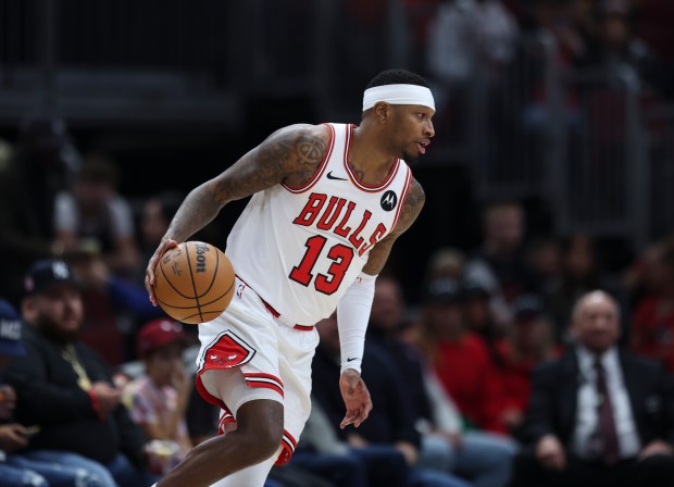 Bulls forward Torrey Craig dribbles around the arc during a game against the Hornets on Dec. 6, 2023, at the United Center.