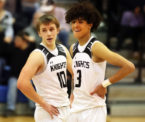 Kaneland's Troyer Carlson (10) and Evan Frieders (3) react to a Marion foul in the fourth quarter during the Class 3A Marmion Regional final game on Friday, Feb. 23, 2023 in Aurora. Kaneland won, 58-50.H. Rick Bamman / For the Beacon-News