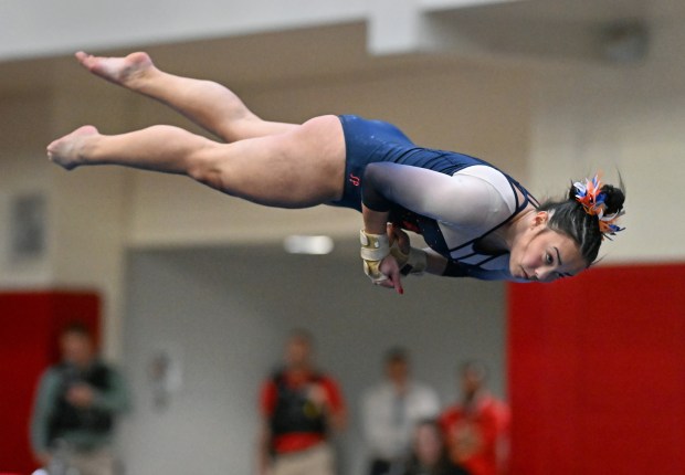 Oswego's Ava Sullivan performing on the Floor Exercise during the finals of the IHSA State Meet, Saturday, at Palatine High School, February 17, 2024. (Brian O'Mahoney for the Chicago Tribune)