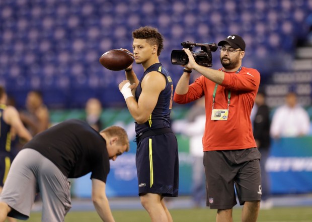 Texas Tech quarterback Patrick Mahomes runs a drill at the NFL football scouting combine Saturday, March 4, 2017, in Indianapolis. (AP Photo/David J. Phillip)