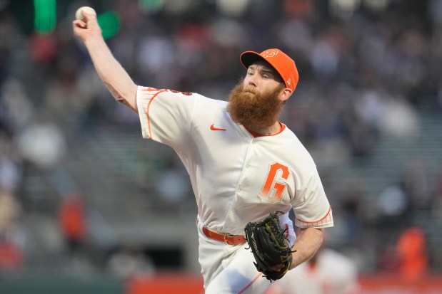 San Francisco Giants pitcher John Brebbia works against the San Diego Padres during the first inning of a baseball game in San Francisco, Tuesday, Sept. 26, 2023. (AP Photo/Jeff Chiu)