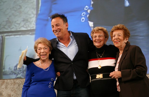 Singer Bruce Springsteen poses with, from left, his aunt Dora Kirby, mother Adele Springsteen, and aunt Ida Urbelis after being honored at the Ellis Island Family Heritage Awards, April 22, 2010, on Ellis Island in New York.