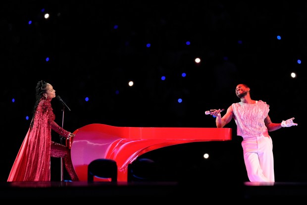 Alicia Keys, left, and Usher perform during halftime of the NFL Super Bowl 58 football game between the San Francisco 49ers and the Kansas City Chiefs on Feb. 11, 2024, in Las Vegas. (Eric Gay/AP)