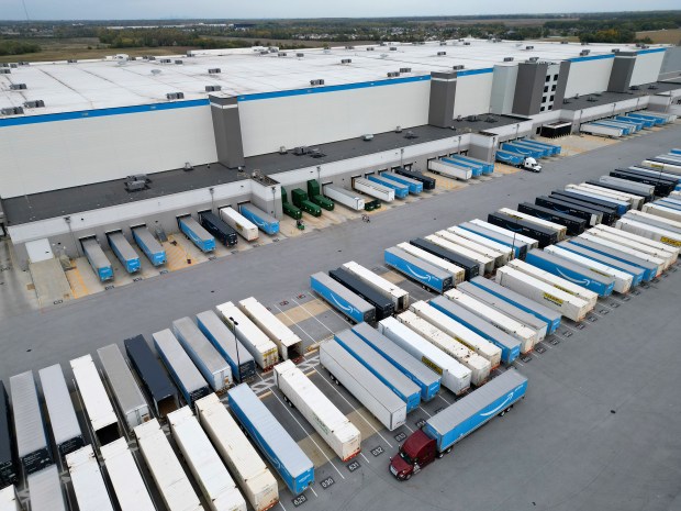 The dock and trucking area behind the Amazon Fulfillment Center ORD5 along Vollmer Road in Matteson on Wednesday, October 18, 2023. Fulfillment and distribution centers like these will be prohibited from Deerfield under proposed ordinance amendments.(Stacey Wescott/Chicago Tribune)