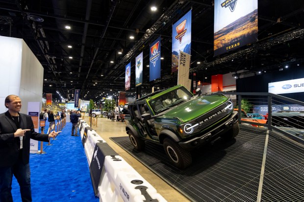 A Ford Bronco navigates the test track during the Chicago Auto Show preview day, Feb. 8, 2024, at McCormick Place. (Brian Cassella/Chicago Tribune)