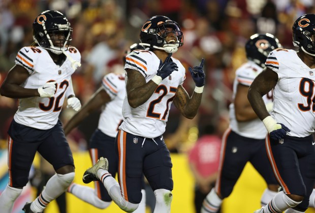 Bears cornerback Greg Stroman Jr. (27) celebrates an interception against the Commanders on Oct. 5, 2023, at FedEx Field. (Brian Cassella/Chicago Tribune)