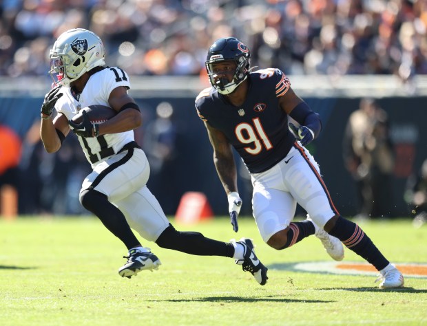 Bears defensive end Yannick Ngakoue attempts to tackle Raiders wide receiver Tre Tucker on Oct. 22, 2023, at Soldier Field. (Trent Sprague/Chicago Tribune)