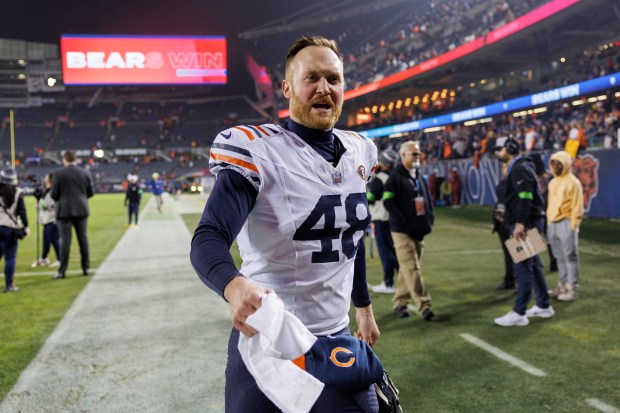 Bears long snapper Patrick Scales walks off the field after a victory against the Cardinals on Dec. 24, 2023, at Soldier Field. (Armando L. Sanchez/Chicago Tribune)