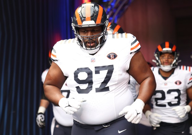 Bears defensive tackle Andrew Billings runs onto the field before a game against the Cardinals on Dec. 24, 2023, at Soldier Field. (Trent Sprague/Chicago Tribune)