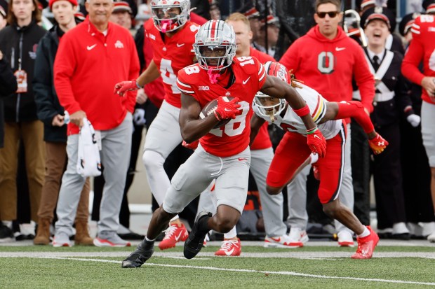 Ohio State wide receiver Marvin Harrison runs after a catch against Maryland on Oct. 7, 2023, in Columbus, Ohio. (AP Photo/Jay LaPrete)