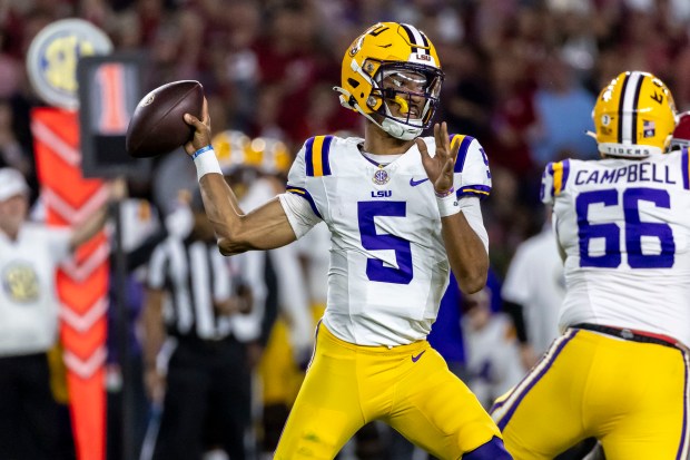 LSU quarterback Jayden Daniels throws a pass against Alabama on Nov. 4, 2023, in Tuscaloosa, Ala. (AP Photo/Vasha Hunt)