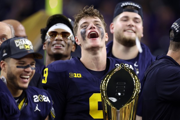 Michigan quarterback J.J. McCarthy celebrates after defeating Washington in the CFP national championship game on Jan. 8, 2024, in Houston. (Maddie Meyer/Getty Images)