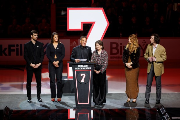 Chris Chelios and his family attend a ceremony to retire his No. 7 jersey before the Blackhawks play the Detroit Red Wings at the United Center Sunday Feb. 25, 2024 in Chicago. The Chicago native played for the Blackhawks for nine of his 26 NHL seasons. (Armando L. Sanchez/Chicago Tribune)