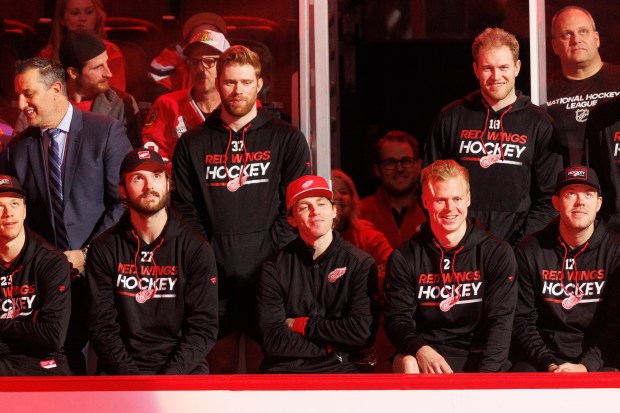 Former Blackhawks player and Detroit Red Wings right wing Patrick Kane smiles while attending a ceremony to retire Chris Chelios's No. 7 Blackhawks jersey before the Blackhawks play the Detroit Red Wings at the United Center Sunday Feb. 25, 2024 in Chicago. The Chicago native played for the Blackhawks for nine of his 26 NHL seasons. (Armando L. Sanchez/Chicago Tribune)