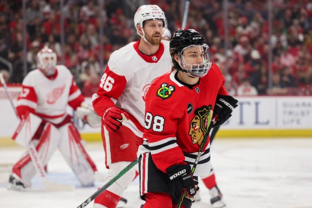 Detroit Red Wings defenseman Jeff Petry (46) guards Chicago Blackhawks center Connor Bedard (98) during the first period at the United Center Sunday Feb. 25, 2024 in Chicago. (Armando L. Sanchez/Chicago Tribune)