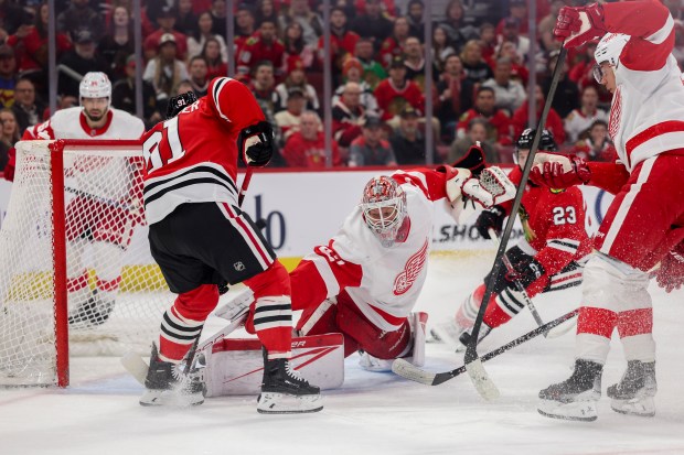 Detroit Red Wings goaltender James Reimer (47) blocks a shot from Chicago Blackhawks left wing Anthony Beauvillier (91) during the first period at the United Center Sunday Feb. 25, 2024 in Chicago. (Armando L. Sanchez/Chicago Tribune)