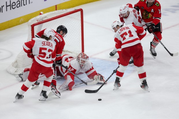 Detroit Red Wings goaltender James Reimer (47) blocks a shot for Chicago Blackhawks right wing Joey Anderson (15) during the third period at the United Center Sunday Feb. 25, 2024 in Chicago. (Armando L. Sanchez/Chicago Tribune)