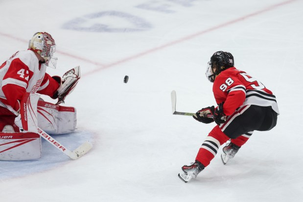 Chicago Blackhawks center Connor Bedard (98) tries to score a goal past Detroit Red Wings goaltender James Reimer (47) during the third period at the United Center Sunday Feb. 25, 2024 in Chicago. (Armando L. Sanchez/Chicago Tribune)