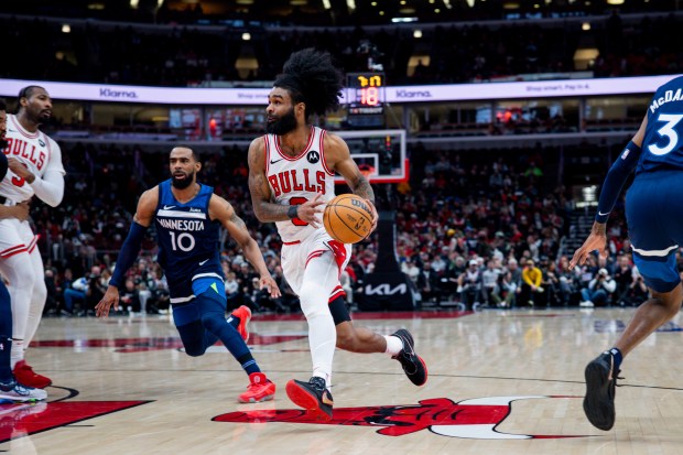 Chicago Bulls guard Coby White (0) drives to the basket during a game between the Chicago Bulls and the Minnesota Timberwolves on Tuesday, Feb. 6, 2024, at the United Center in Chicago. (Vincent Alban/Chicago Tribune)