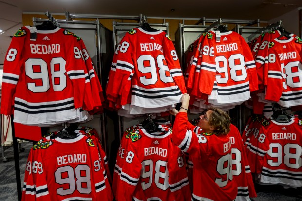 Bobbi Ruffalo checks out the Connor Bedard jerseys for sale, Feb. 15, 2024 at the United Center in Chicago. (Vincent Alban/Chicago Tribune)