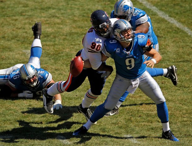 Chicago Bears' Julius Peppers sacks Detroit Lions' Matthew Stafford causing him to fumble in 2nd quarter at Soldier Field in Chicago, IL on Sunday, September 12, 2010. (Scott Strazzante/Chicago Tribune) B58707894Z.1 ....OUTSIDE TRIBUNE CO.- NO MAGS, NO SALES, NO INTERNET, NO TV, NEW YORK TIMES OUT, CHICAGO OUT, NO DIGITAL MANIPULATION...