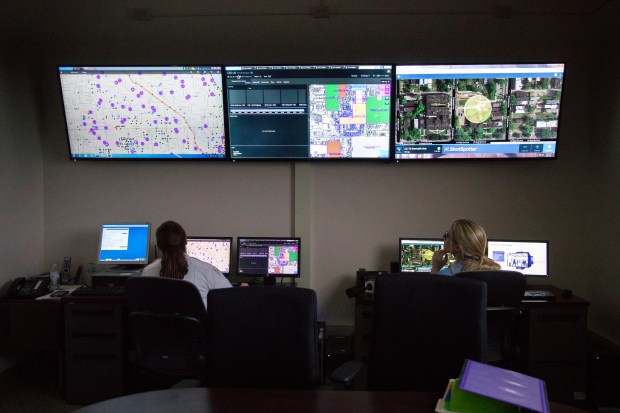 Members of the Chicago Police Department work with technologies like ShotSpotter at the Chicago Police Department 11th District headquarters on Feb. 8, 2017, in Chicago. (Erin Hooley/Chicago Tribune)