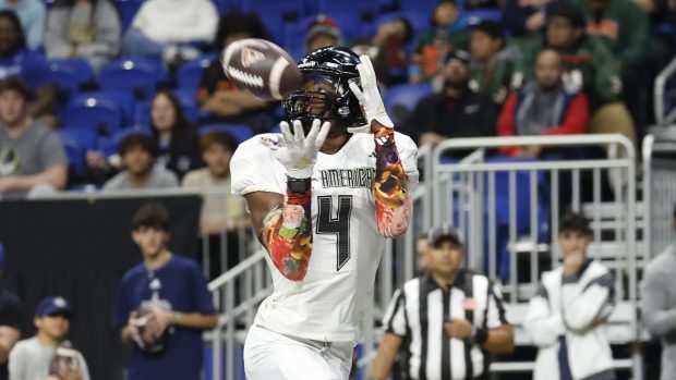 SAN ANTONIO, TX - JANUARY 06: Jeremiah Smith #4 of the East catches a touchdown pass in the first half at the All American Bowl at the Alamodome on January 6, 2024 in San Antonio, Texas. (Photo by Ronald Cortes/Getty Images) ** OUTS - ELSENT, FPG, CM - OUTS * NM, PH, VA if sourced by CT, LA or MoD **