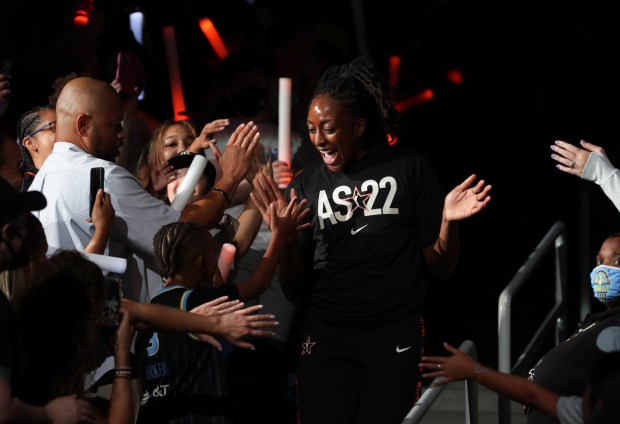 Nneka Ogwumike is greeted by fans as she enters the arena for the WNBA All-Star game at Wintrust Arena on Sunday, July 10, 2022 in Chicago. (Stacey Wescott/Chicago Tribune)