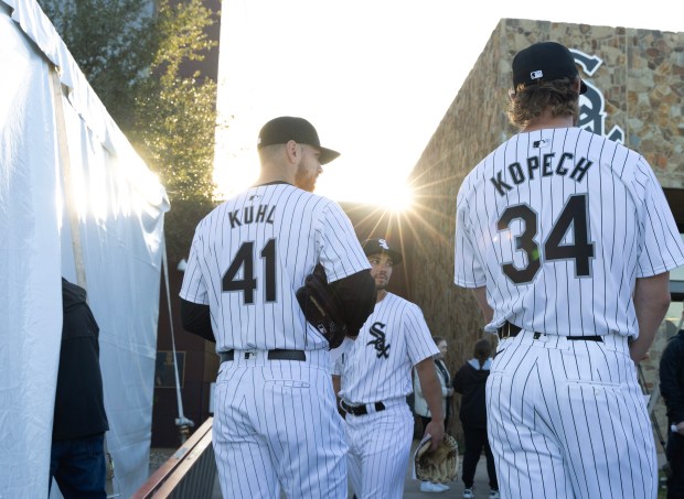 White Sox pitchers Chad Kuhl (41) and Michael Kopech (34) wait to be photographed on media day at Camelback Ranch on Feb. 21, 2024, in Glendale, Ariz. (Stacey Wescott/Chicago Tribune)