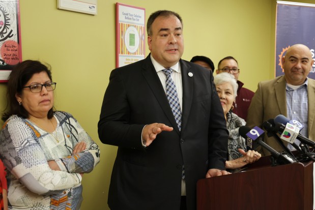 Cook County Assessor Fritz Kaegi stands with Pilsen community leaders and activists to discuss the rise in property taxes in the Pilsen neighborhood on Jan. 20. 2023 in Chicago. (Stacey Wescott/Chicago Tribune)