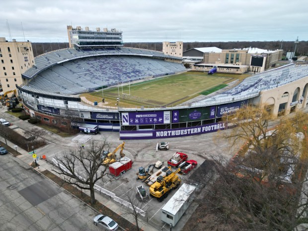 Heavy machinery is parked on Feb. 5, 2024, outside Northwestern University's Ryan Field in Evanston, ahead of its demolition. (Stacey Wescott/Chicago Tribune)
