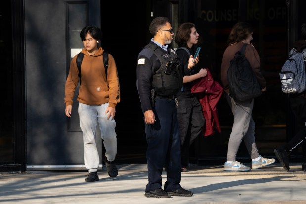 A Chicago police officer at Whitney Young High School, Feb. 20, 2024. (E. Jason Wambsgans/Chicago Tribune)