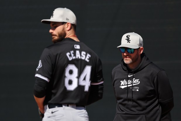 White Sox pitching coach Ethan Katz, right, watches starting pitcher Dylan Cease throw a bullpen session during a spring training workout on Feb. 21, 2024, at Camelback Ranch in Glendale, Ariz. (Michael Reaves/Getty photo) 