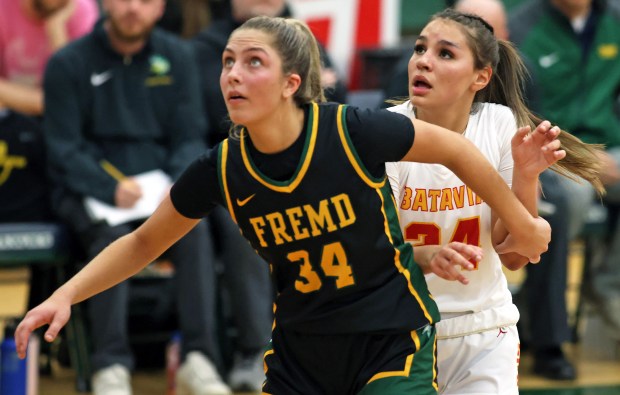 Batavia's Hallie Crane (24) and Fremd's Brynn Eshoo (34) eye a second quarter rebound during the Class 4A Bartlett Supersectional on Monday, Feb. 26, 2024 in Bartlett. Batavia fell 65-46.H. Rick Bamman / For the Beacon-News