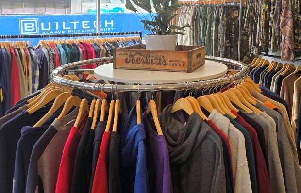 Matthew Hill, owner of the newly opened Elgin Vintage store, says the previously owned clothing he sells is carefully curated to be both fashionable and to draw attention to the benefits of recycling vs. throwing used clothing in the trash.