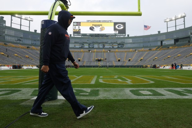 Bears general manager Ryan Poles walks the perimeter of Lambeau Field before a game against the Packers on Jan. 7, 2024, in Green Bay. (John J. Kim/Chicago Tribune)