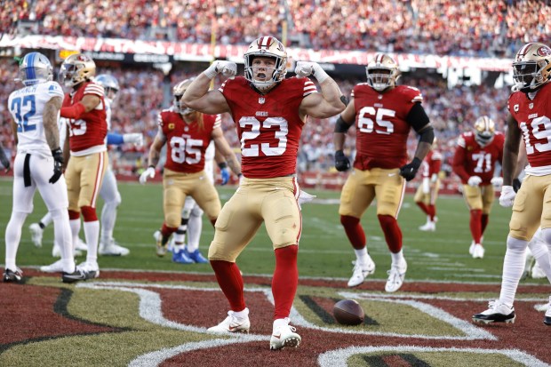 SANTA CLARA, CA - JANUARY 28: Christian McCaffrey #23 of the San Francisco 49ers celebrates after rushing for a 2-yard touchdown during the NFC Championship game against the Detroit Lions at Levi's Stadium on January 28, 2024 in Santa Clara, California. The 49ers defeated the Lions 34-31. (Photo by Michael Zagaris/San Francisco 49ers/Getty Images)