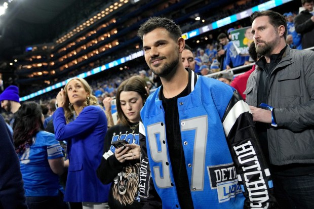 DETROIT, MICHIGAN - JANUARY 14: Actor Taylor Lautner reacts on the sideline prior to a game between the Los Angeles Rams and Detroit Lions in the NFC Wild Card Playoffs at Ford Field on January 14, 2024 in Detroit, Michigan. (Photo by Nic Antaya/Getty Images)