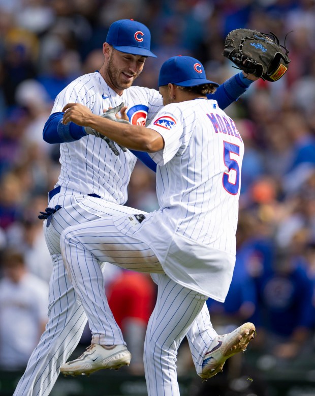 Chicago Cubs Cody Bellinger and Christopher Morel celebrate the win Wednesday, Aug. 30, 2023, at Wrigley Field.