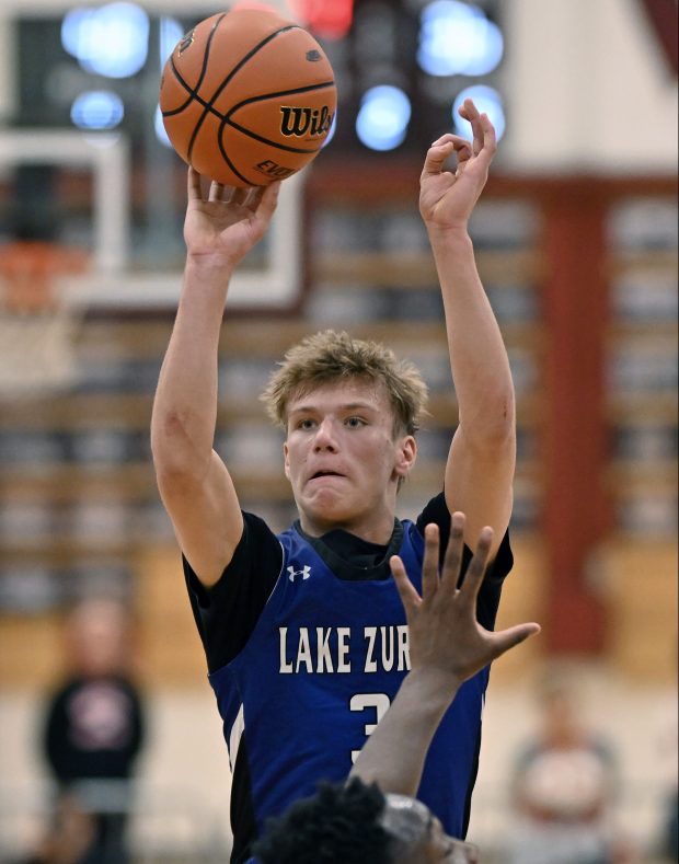 Lake Zurich's Kain Kretschmar (3) puts up a shot during the 4th quarter of Wednesday's IHSA Class 4A Elgin Sectional Semifinal against Palatine, February 28, 2024. Palatine won the game, 53-39. (Brian O'Mahoney for the News-Sun)