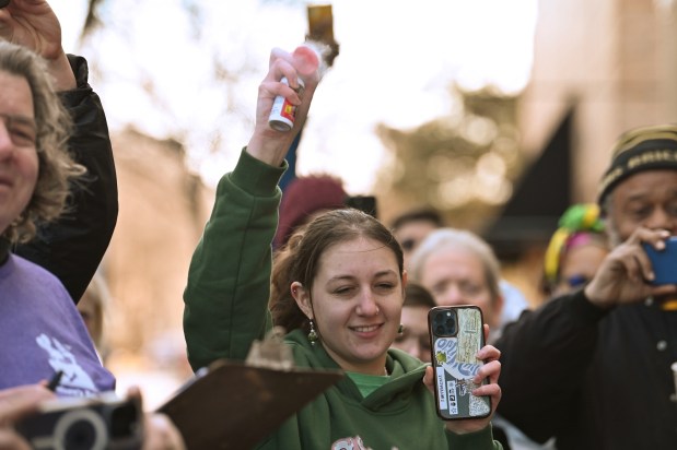 The airhorn is sounded by Jordan Podolsky of Skokie to start the contest at the annual Paczki Eating Contest at Bennison's Bakery in Evanston on Feb. 10, 2024.