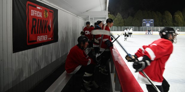 Despite age and 50 years from playing as a teen, Glencoe Bantam Allstars 1974-1975 championship season players were seen jumping off the rim from the bench to enter the ice on Feb. 3, 2024 at the Weinberg Family Recreation Center in Glencoe.