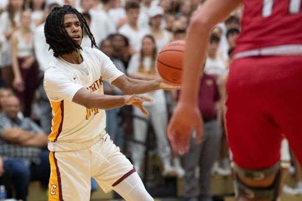 Chesterton guard Jaylon Watts passes the ball during his team's game against Portage in the first round of the Class 4A Chesterton Sectional on Tuesday, February 27, 2024. (Kyle Telechan/for the Post-Tribune)