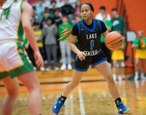 Lake Central point guard Kennedie Burks looks for a route upcourt during the Class 4A LaPorte Regional championship game against Northridge on Saturday, February 11, 2023. (Kyle Telechan for the Post-Tribune)