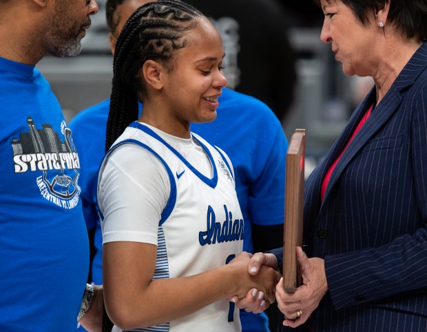 Lake Central's Kennedie Burks receives the Patricia L. Roy Mental Attitude Award after the Class 4A state championship game against Lawrence Central at Gainbridge Fieldhouse in Indianapolis on Saturday, Feb. 24, 2024. (Michael Gard/for the Post-Tribune)