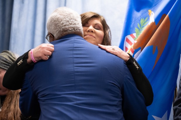 Ollie Hubbard, whose daughter, Lauren Calvillo, was killed in a 2015 shooting hugs U.S. Attorney Clifford D. Johnson's after a press conference to announce the sentence given to Latin Counts member Eduardo Luciano, who was instrumental in the shooting, on Wednesday, February 7, 2024. (Kyle Telechan for the Post-Tribune)