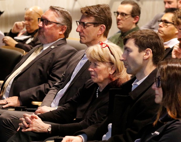 From left, PNW Chancellor Chris Holford, U.S. Rep. Frank Mrvan, D-Highland, DOE Under Secretary for Science and Innovation Geri Richmond, Jake Higdon, and Traci Forrester watch a video detailing some of the research PNW's Center for Innovation through Visualization and Simulation is doing on Feb. 16, 2024. CIVS recently received a $7.1 million grant from the U.S. Dept. of Energy for steel decarbonization research. (John Smierciak/Post-Tribune)